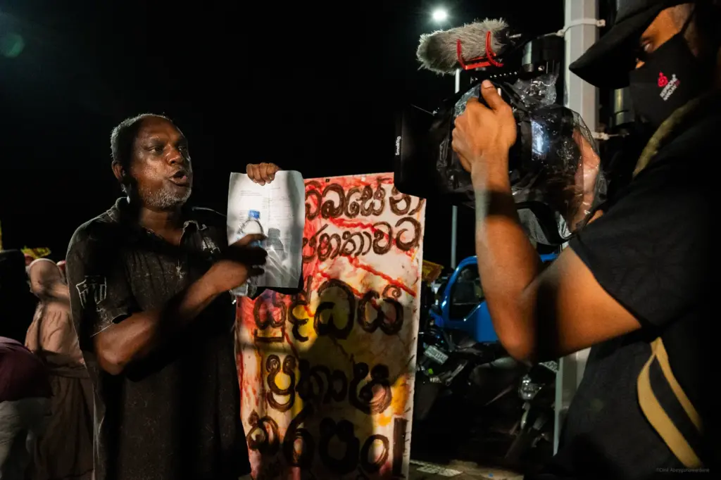 A protester making a statement to a reporter at Galle Face protest site during the Sri Lankan uprising of 2022