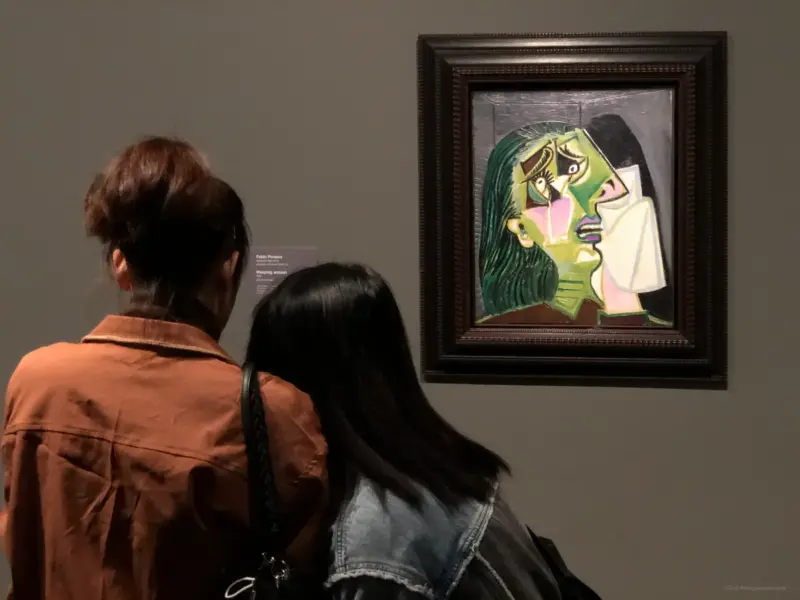 Two girls in front of Weeping Woman by Pablo Picasso - Picasso Century - National Gallery of Victoria (NGV), Melbourne, Australia - People and Art Photo Gallery - Struck by Light